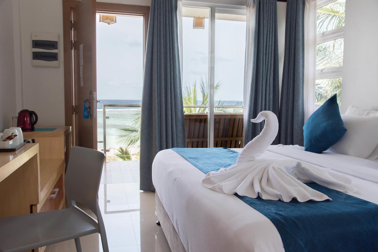 Hotel Reef Edge Thulusdhoo, Maldives Extérieur photo